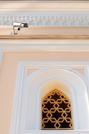 Small security camera near museum windowの写真素材