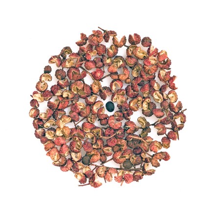 Chinese Sichuan pepper or Prickly Ash Peel (hua jiao) isolated over whiteの写真素材