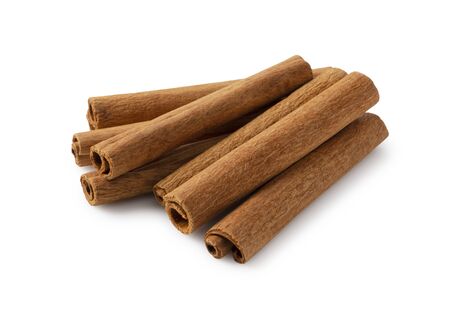 Cinnamon sticks placed on a white background