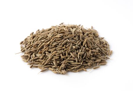 Cumin seeds placed on a white background