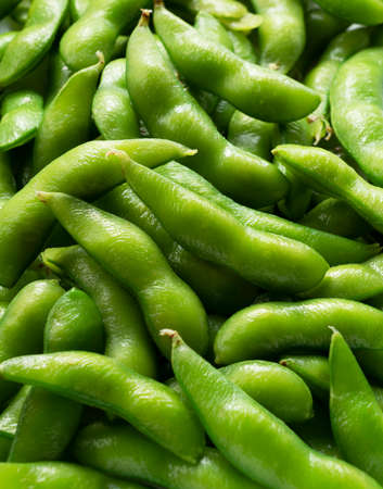 Close-up photo of Japanese edamame across the screenの写真素材