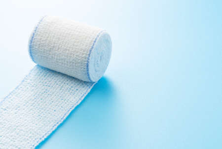 Bandages on a blue background.の写真素材