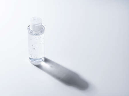 Instant disinfectant bottle on white background, clear gel, no label. Antibacterial, hydro alcohol, ethyl alcohol. Mini travel pocket.の写真素材