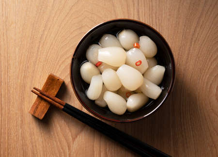 Japanese Rakkyo placed in the background of a tree. A view from above