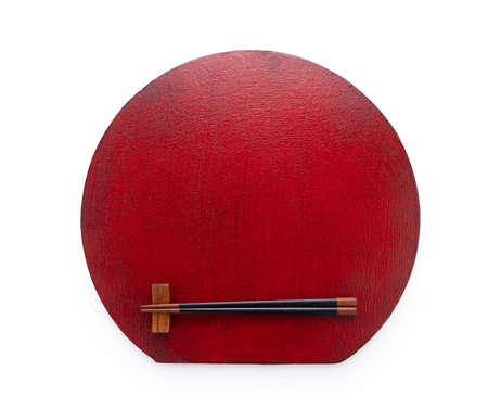 Japanese red tray and chopsticks placed on a white background. View from aboveの写真素材