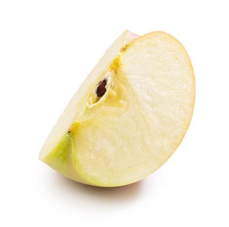 Quartered apples placed on a white backgroundの写真素材