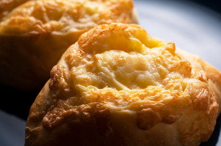 Cheese French bread placed in the background on a wooden table. Japanese Cooking Breadの写真素材