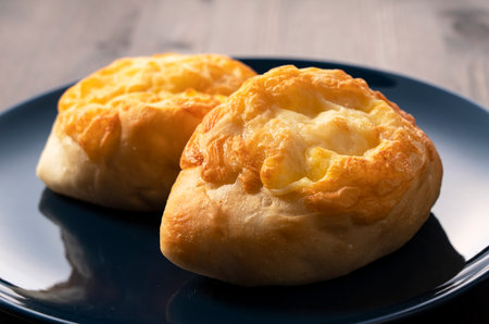 Cheese French bread placed in the background on a wooden table. Japanese Cooking Breadの写真素材