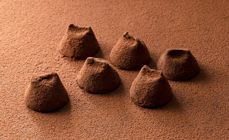 Close up of cocoa powder and truffle chocolate