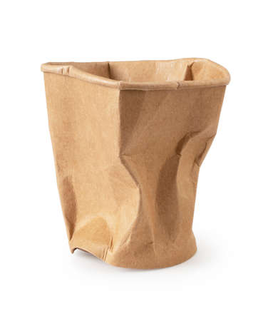 Crushed brown paper cup on white backgroundの写真素材