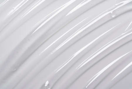 Serum texture on transparent liquid gel background. Transparent beauty skin care product sample.