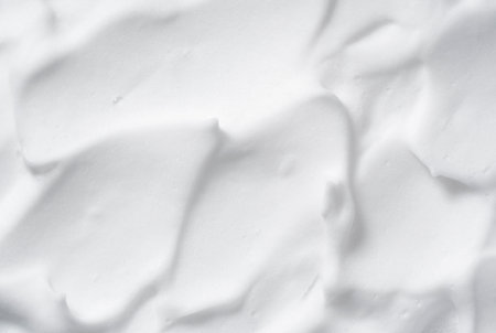 Foam bubble from soap or shampoo washing on top view.Skincare cleanser foam texture.