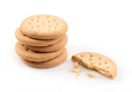 Biscuit and broken biscuit placed on white background.