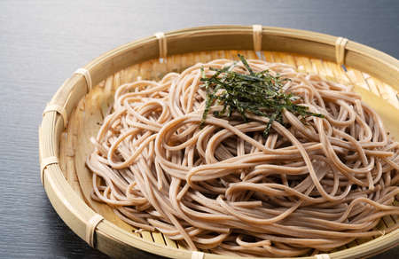 Zaru soba placed against a black background. Zaru soba is a traditional Japanese food.の写真素材