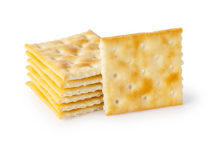 Crackers placed on top of each other on a white background.の写真素材
