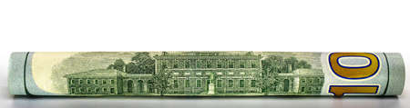 One hundred dollar banknote rolled into a tube. Close-up. Isolated white background. Concept for design.の写真素材