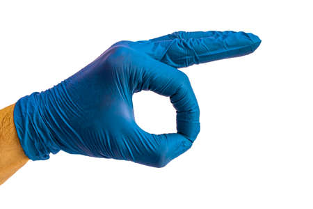 Hand in a medical glove. Gesture and symbol. Hand gesture. Concept for design. Medicine. Diagnosis. Deaf and dumb. Isolated white background. Copy space.の写真素材