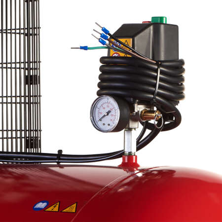 Air compressor. Professional equipment and tools. Industrial appliances. Isolated background.の写真素材