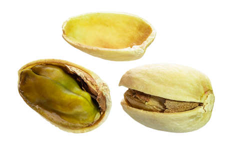 Pistachios isolated closeup without shell as package design element collection on white background. Nut macro. Pistachio kernels. Full depth of fieldの写真素材