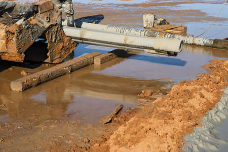 Drilling rig. Drilling deep wells. Additional equipment and mechanisms for the drilling. Delivery of drilling tools and pipes. Mineral exploration. The device of wells for freezing soil.の写真素材