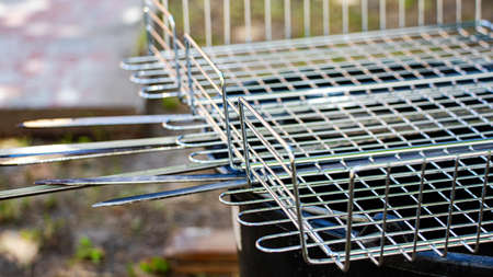 Grill grate for cooking food on fire. Close-up.の写真素材