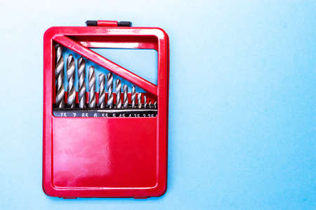 Metal drill set for drilling holes. Construction and home repair. Household chores. Copy space for text.の写真素材