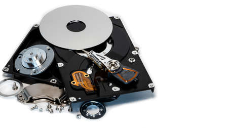 Disassembled hard drive from the computer, hdd with mirror effect. Opened hard drive from the...