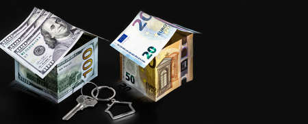 The concept of mortgage and rental housing and real estate. Mortgage credit lending. Metal keychain...