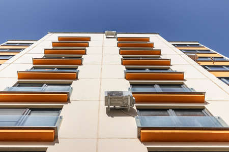 Multi-storey modern residential building. Housing construction. Residential fund. Sleeping residential area. Mortgage loans for young familiesの写真素材