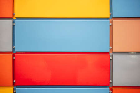 Closeup of a multi color metal panel typically found on buildingsの写真素材
