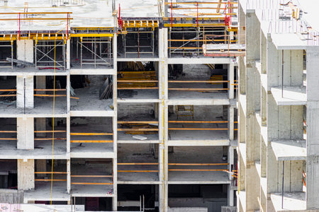 Monolithic frame construction of the building. Solid walls of concrete. The framework for the walls....