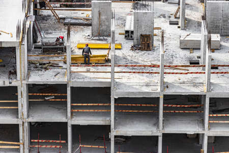 Construction of a monolithic reinforced concrete house. Modern building technologies. Construction...