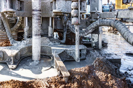 A drilling rig is working on a site. Deep hole drilling. Geological exploration work. Mineral...