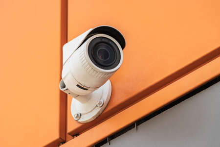 CCTV camera on the facade of the house. Camera for security and public order preventionの写真素材