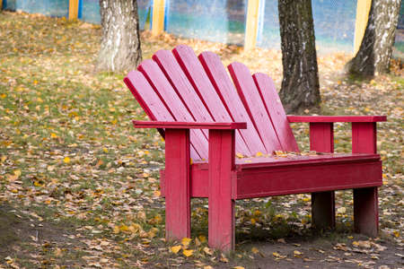 Cozy bench in the autumn park. Peace and quiet. Peace with nature.の写真素材