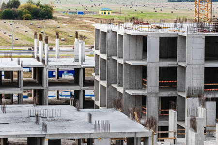 Monolithic frame construction of the building. Solid walls of concrete. The framework for the walls....