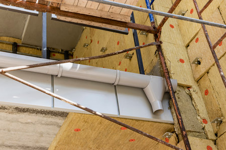 Power saving technology: plates of mineral wool on the side wall, between the metal profiles for...