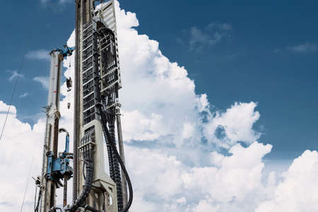 Drilling rig close-up at a construction site. Deep hole drilling. Extraction of minerals oil and...