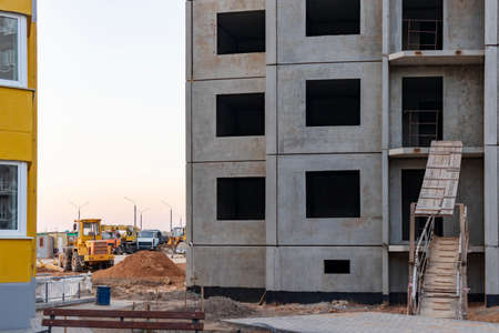 Construction of a multi-storey panel reinforced concrete house. Safe ramp at the entrance to the...