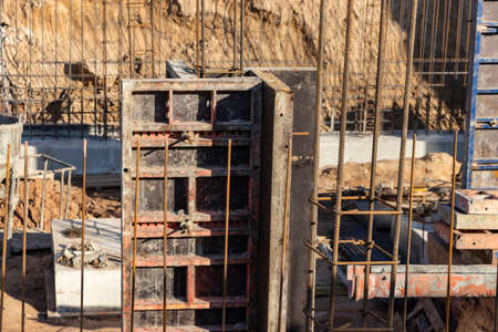 Monolithic foundation with metal reinforcement. Forms vertical formwork structures for the basement...