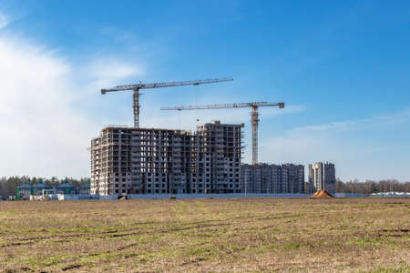 Monolithic frame construction of the building. Solid walls of concrete. The framework for the walls. Formwork for walls made of concrete. Construction site close upの写真素材