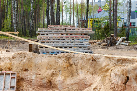 Construction formwork for concrete. Materials for the construction of a concrete foundation at a...