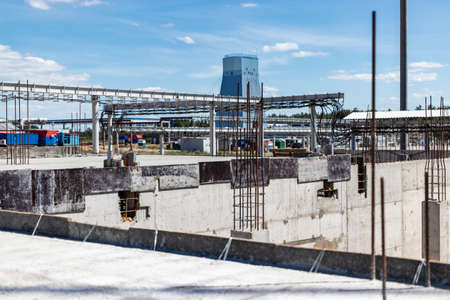 Construction of a monolithic concrete building. Modern monolithic construction. Reinforced concrete...