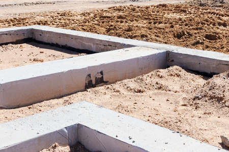 Strip foundation of a new building. The foundation for the construction of the walls of the houseの写真素材