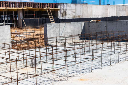 Construction of a monolithic concrete building. Modern monolithic construction. Reinforced concrete...