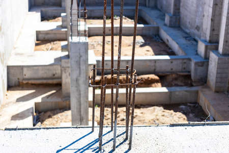 Construction of a monolithic concrete building. Modern monolithic construction. Reinforced concrete walls. Fendaments and grillages during the construction of the buildingの写真素材