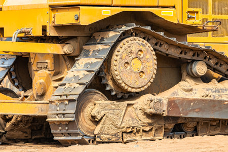 Powerful crawler bulldozer close-up at the construction site. Construction equipment for moving large volumes of soil. modern construction machine. road building machineの写真素材