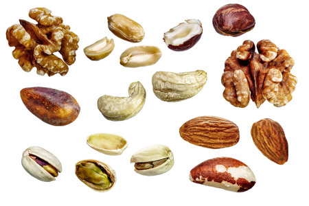 Various types of nuts. isolated background. Walnut, hazelnut, peanut, pistachio, cashewの写真素材