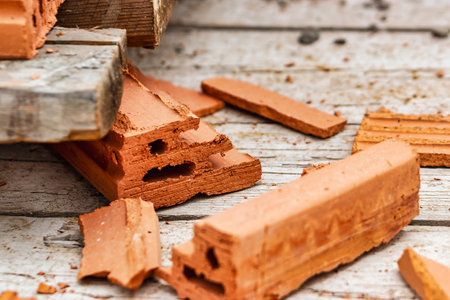 Red ceramic bricks at the construction site. Keramoblock. Hollow brick. Construction of a red brick...