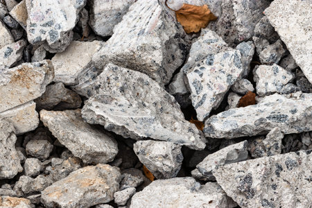 Crushed concrete. Reuse of concrete. Recycling of reinforced concrete for further use. Background of...